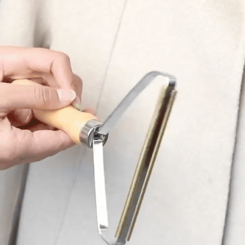Reusable lint brush being cleaned and reused